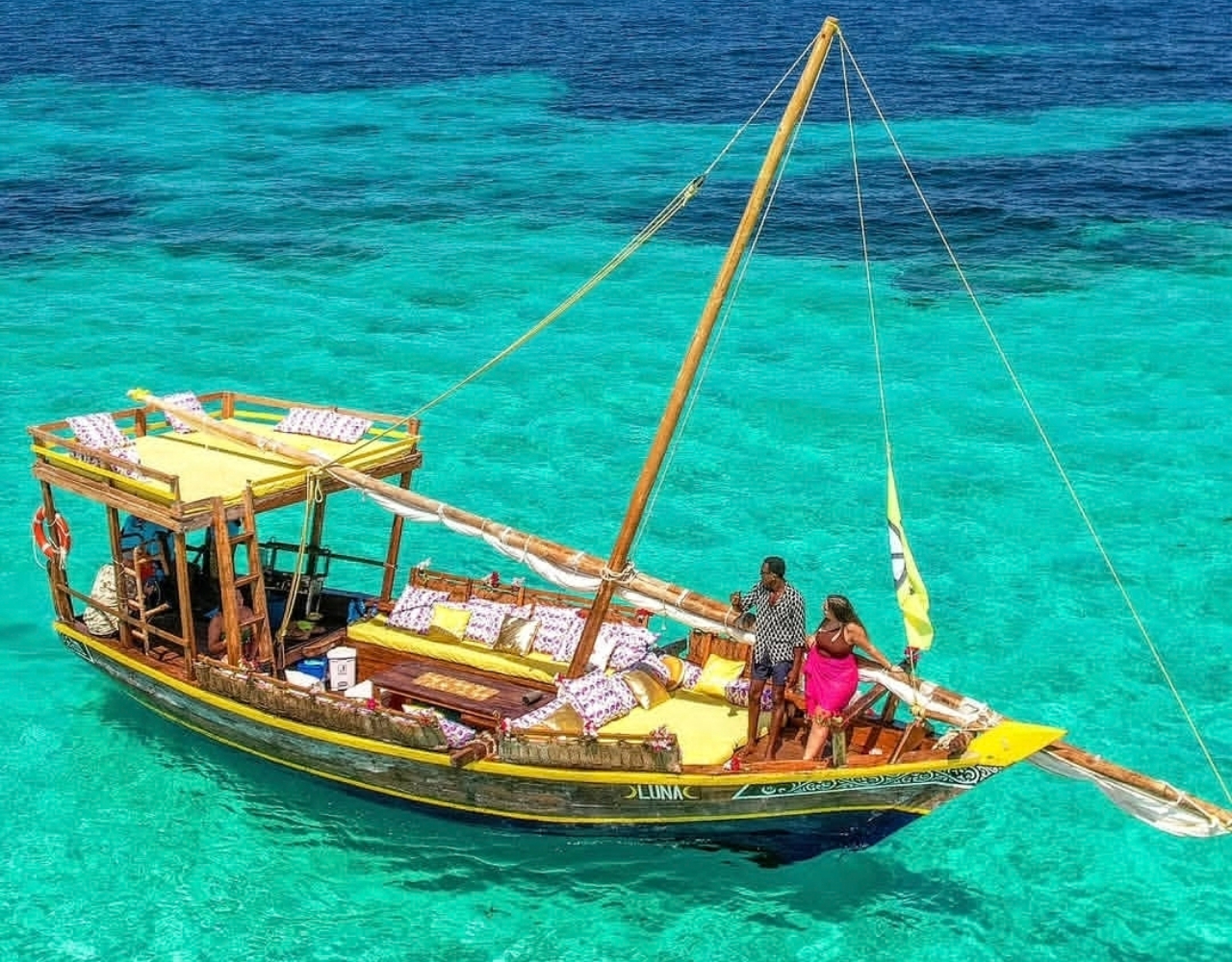 Mnemba Island Dolphins & Snorkeling Full-Day Trip with Dhow